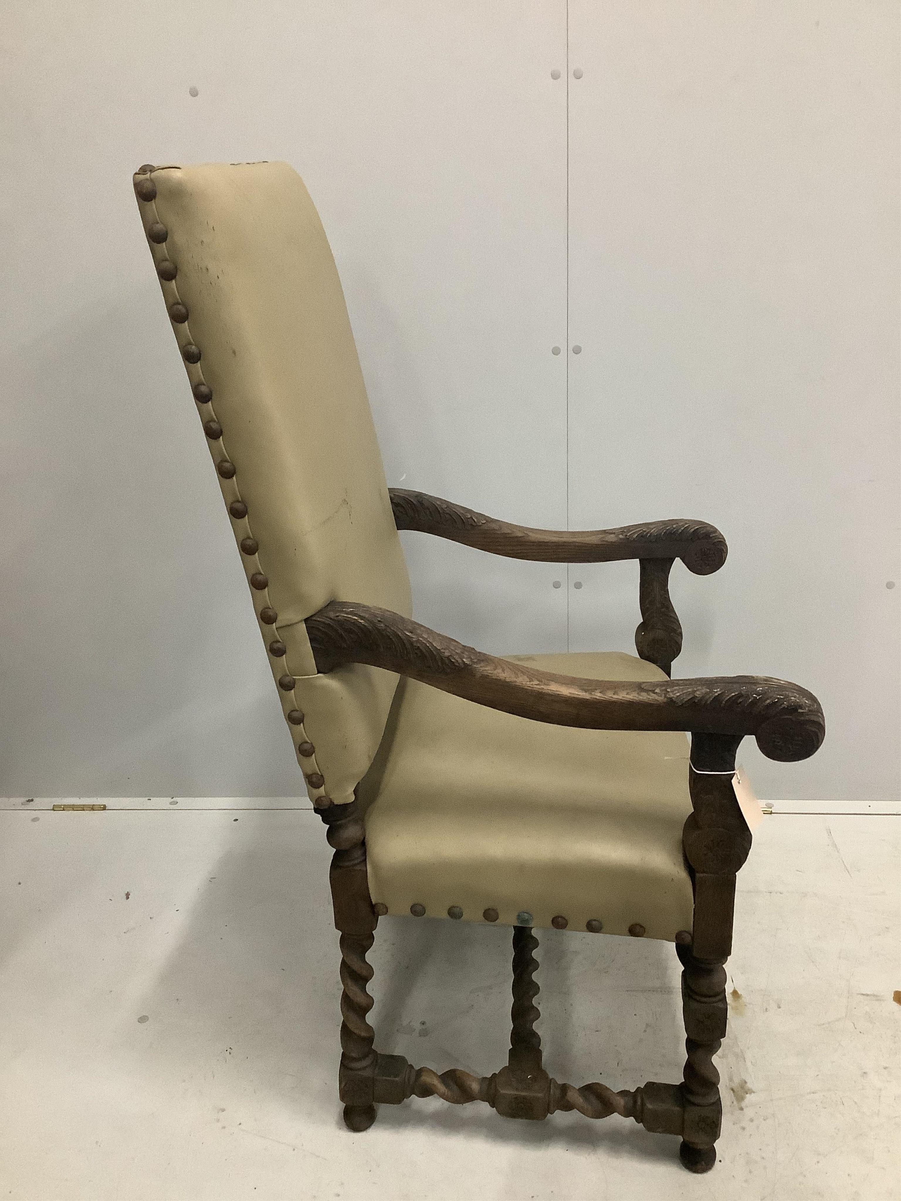 Six Carolean style carved oak dining chairs, two with arms. Condition - poor to fair